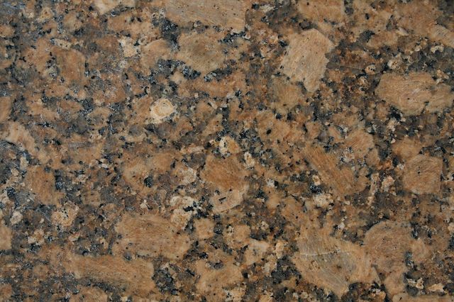 Warm brown granite with black and tan crystals